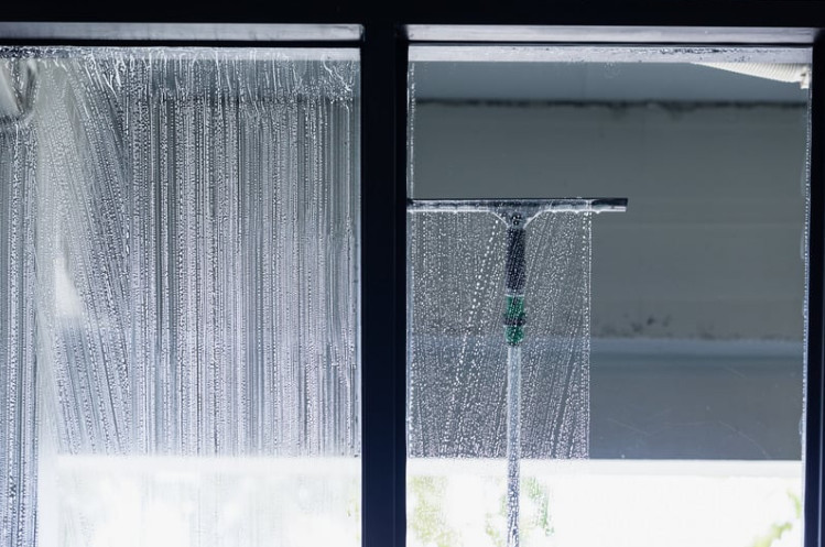 A bright interior with sparkling glass panels highlights the result of effective window cleaning tips used throughout the home. 