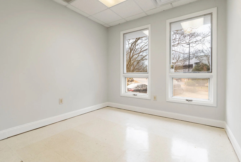 A close-up view of a newly installed single-hung window on a residential home, featuring a fixed upper sash and a movable lower sash slightly opened for ventilation. The frame is clean and modern, with clear glass and tight weather sealing. This image highlights the simple design and functional appeal of single-hung windows, commonly chosen for their space-saving operation and energy efficiency in both traditional and modern homes.